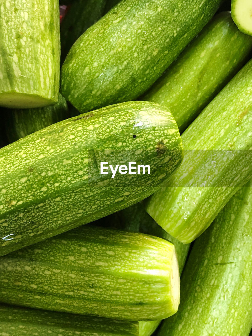 Full frame shot of green zucchini in market