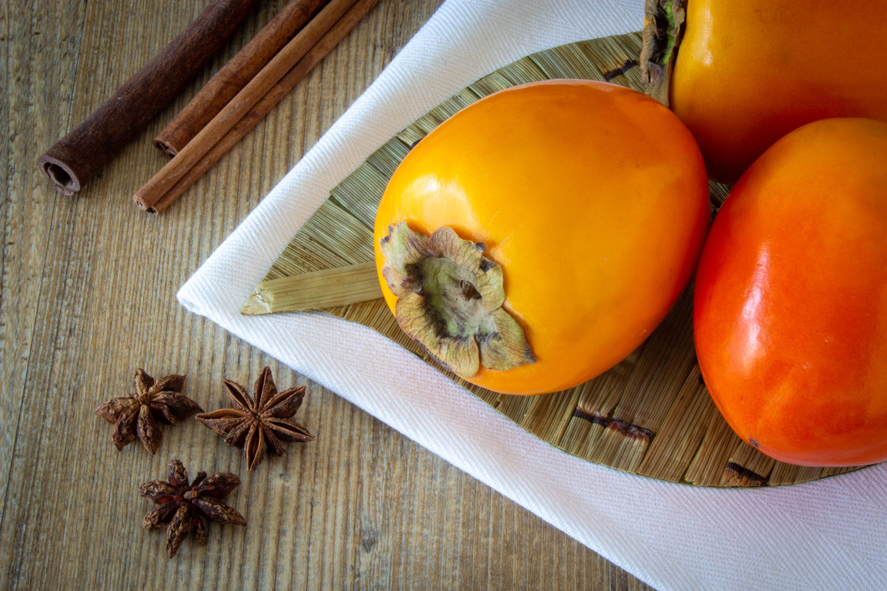 High angle view of persimmon on table
