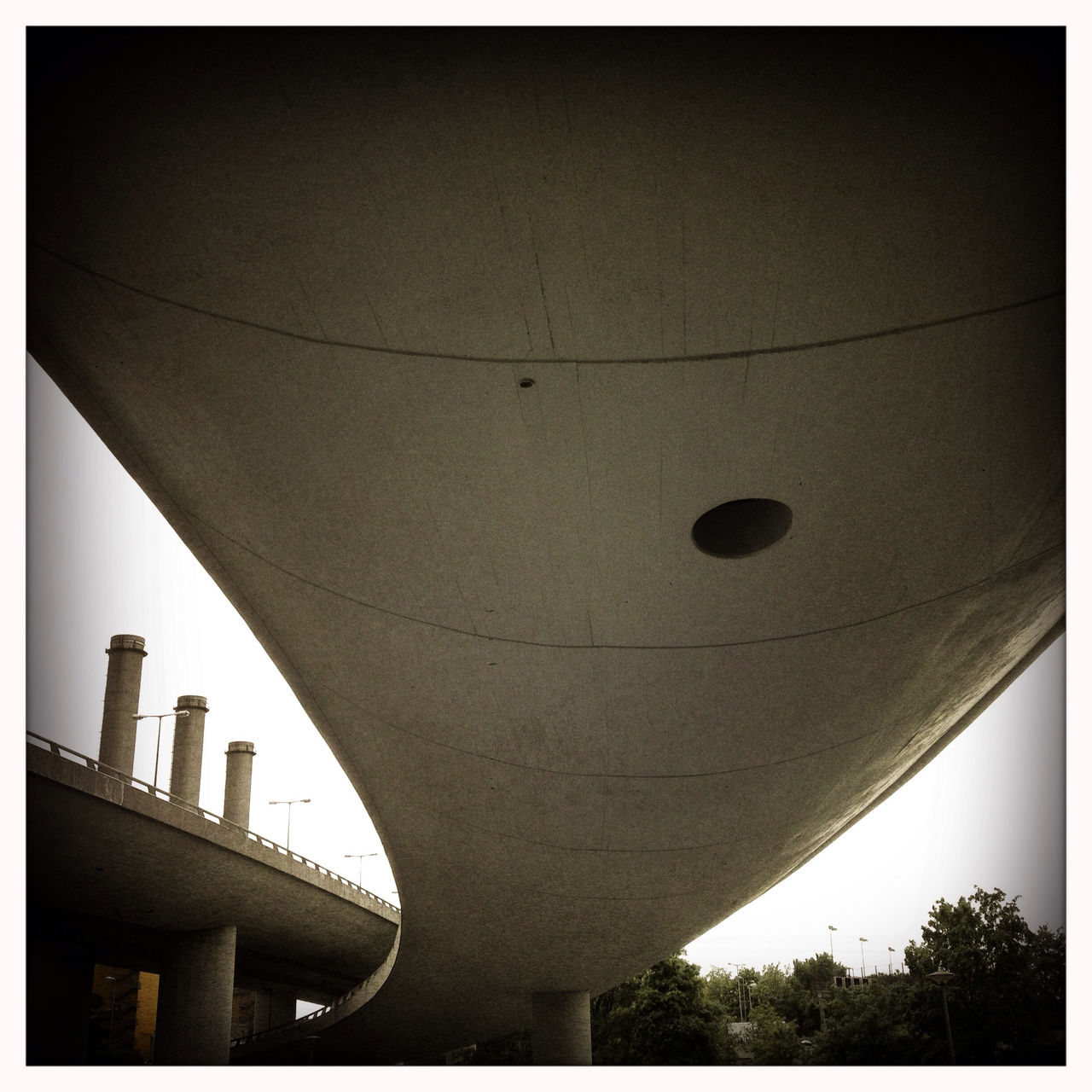 LOW ANGLE VIEW OF BRIDGE AGAINST THE SKY