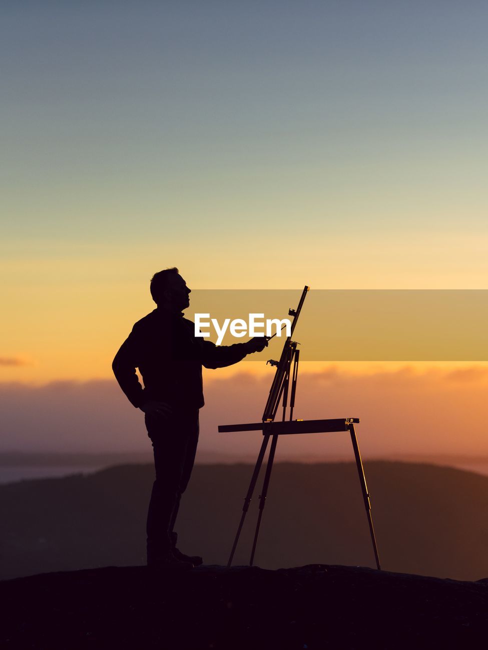 Silhouette Man Painting While Standing Id 118188119