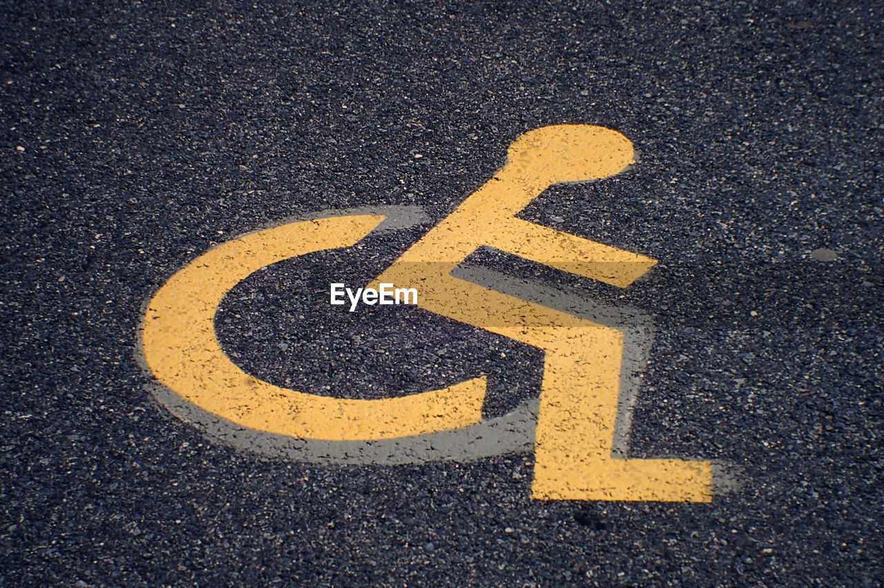 Close-up of disabled parking sign
