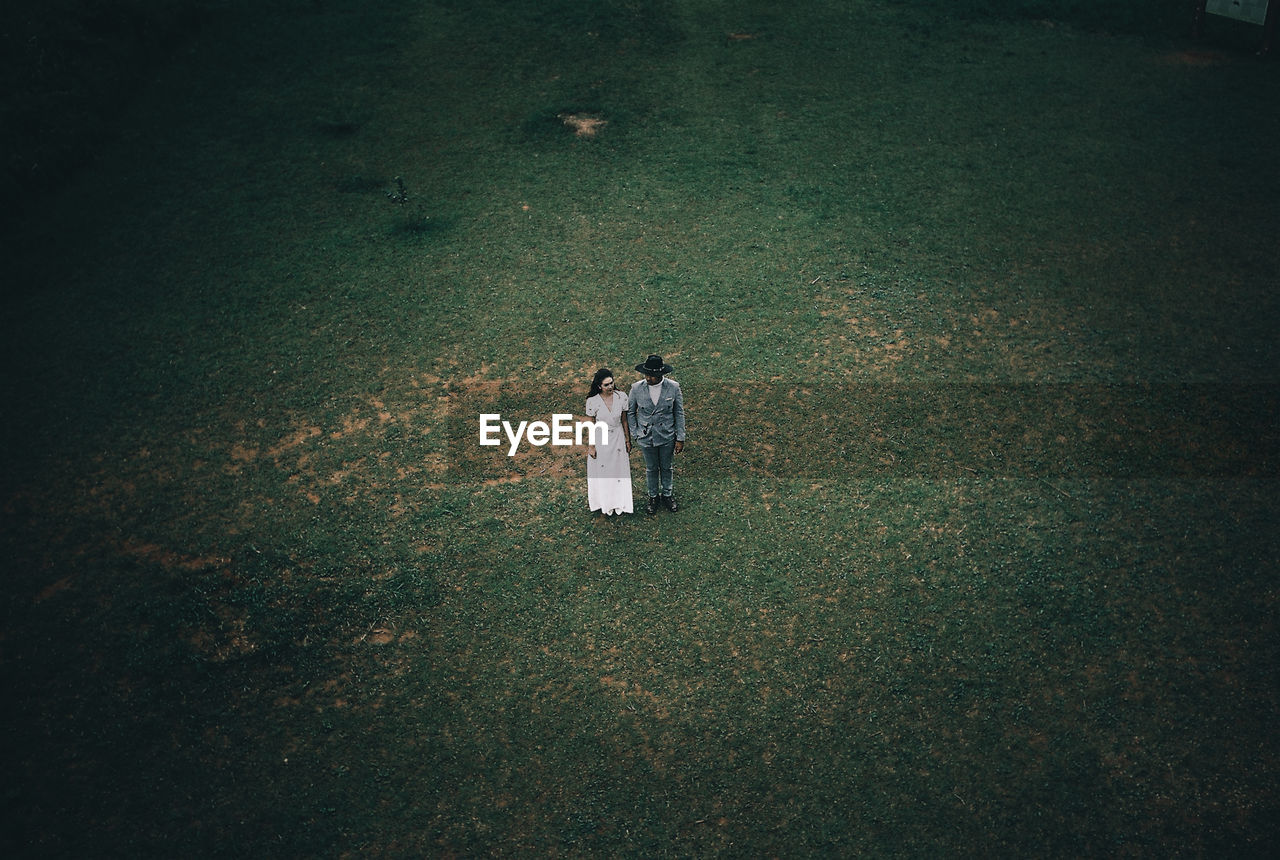 High angle view of couple on field