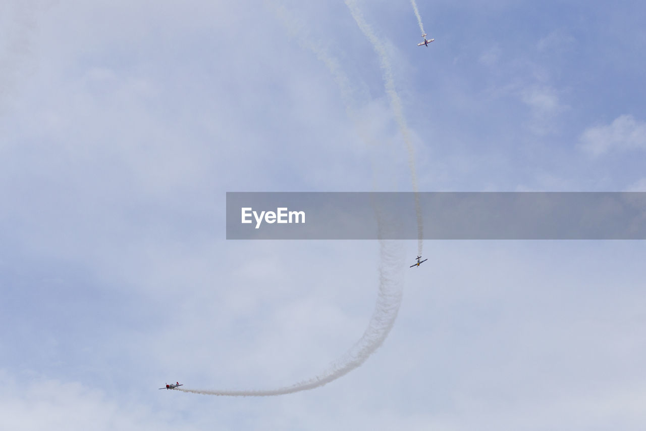 LOW ANGLE VIEW OF AIRSHOW IN SKY