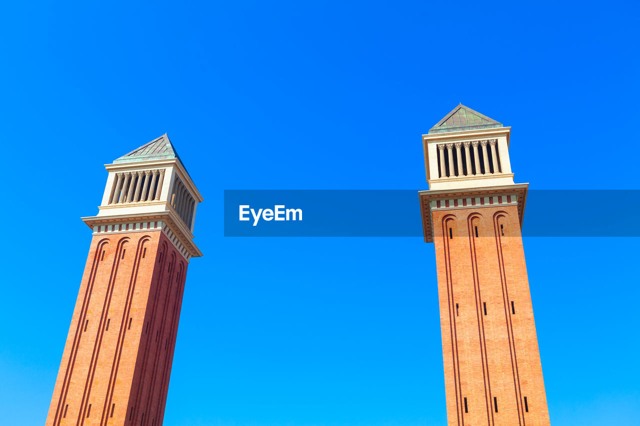 Torres venecianes towers at placa d'espanya in barcelona . pair of towers in barcelona