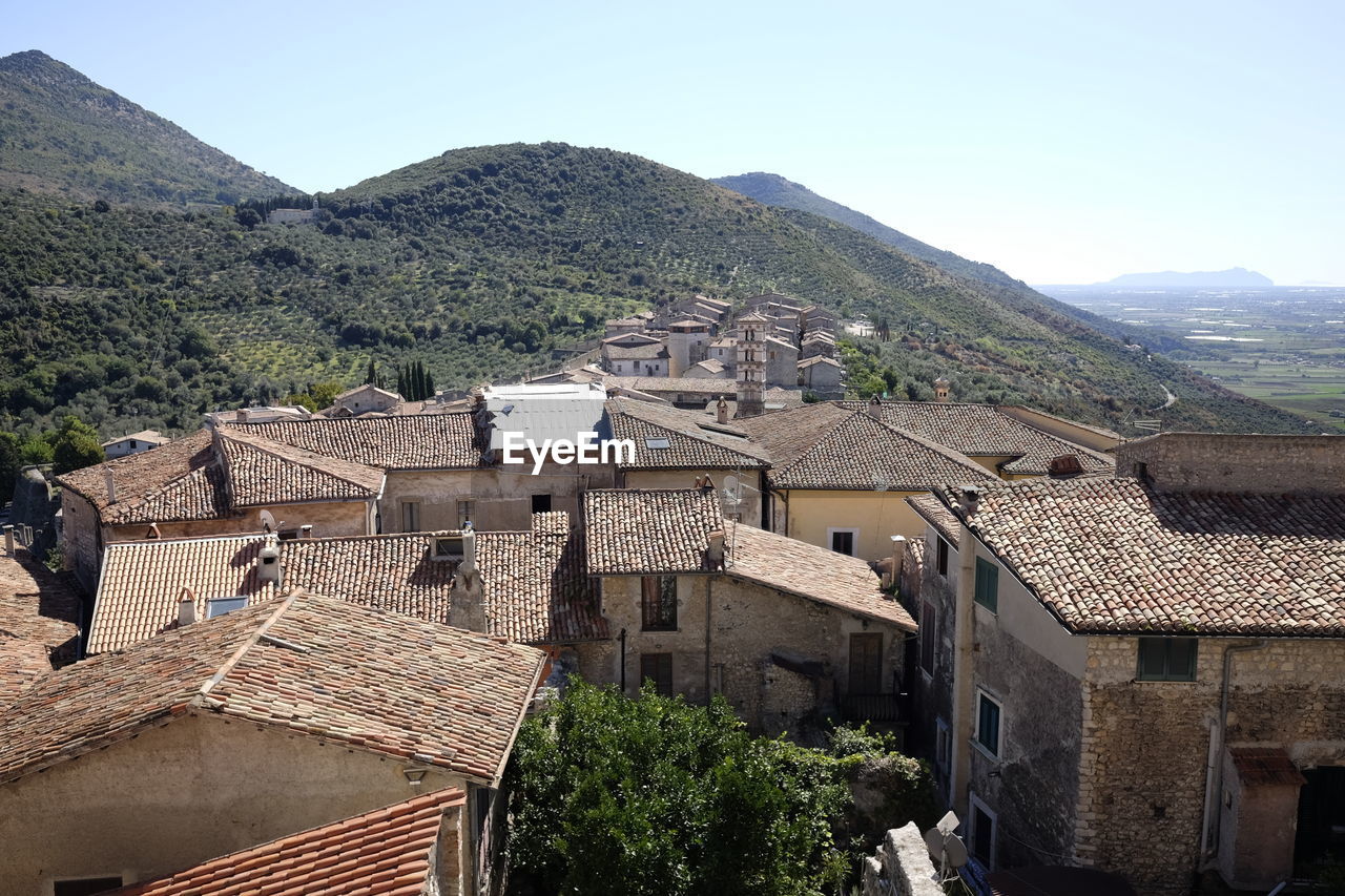 High angle view of houses against clear sky