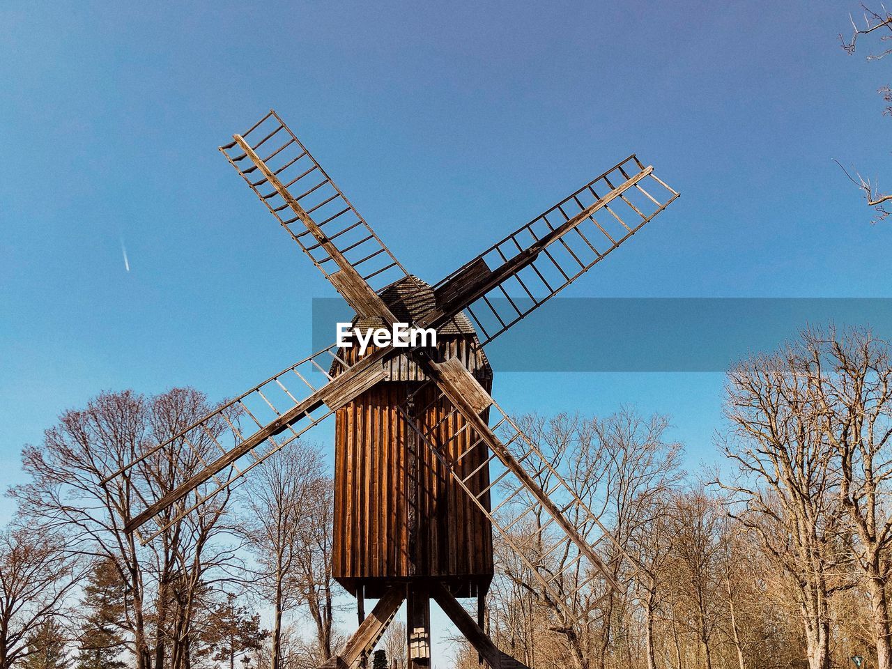 TRADITIONAL WINDMILL AGAINST CLEAR SKY