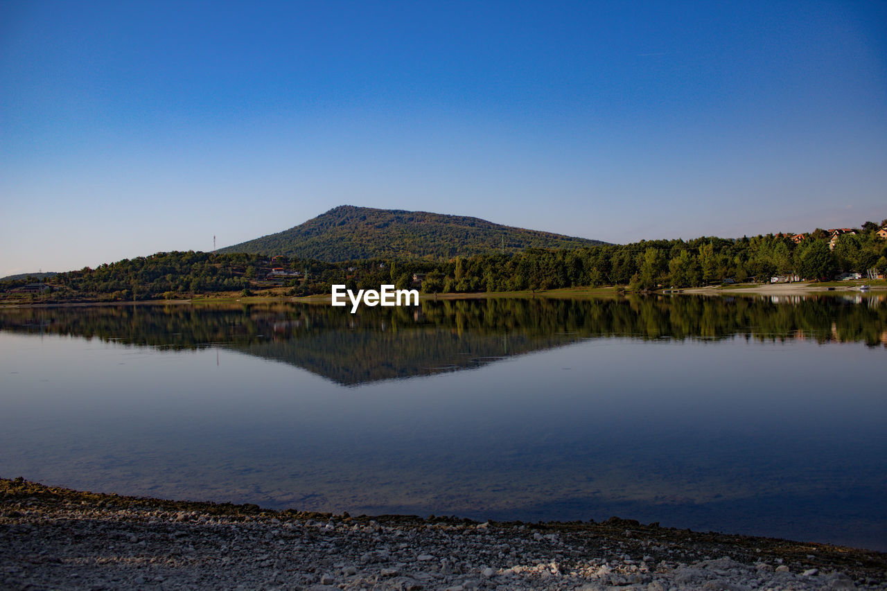 Photography of lake reflection 