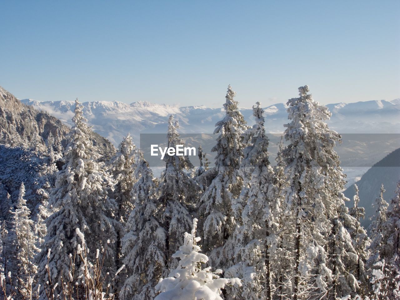 panoramic view of snow covered mountain against clear sky