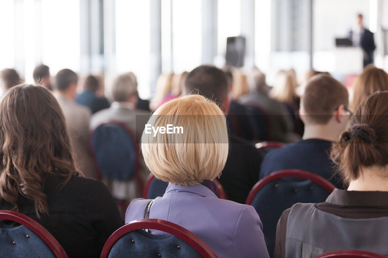 Rear view of people in seminar