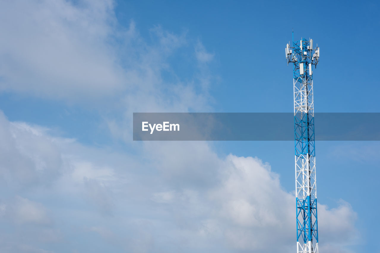 Wireless communication antenna transmitter. telecommunication towers with blue sky.