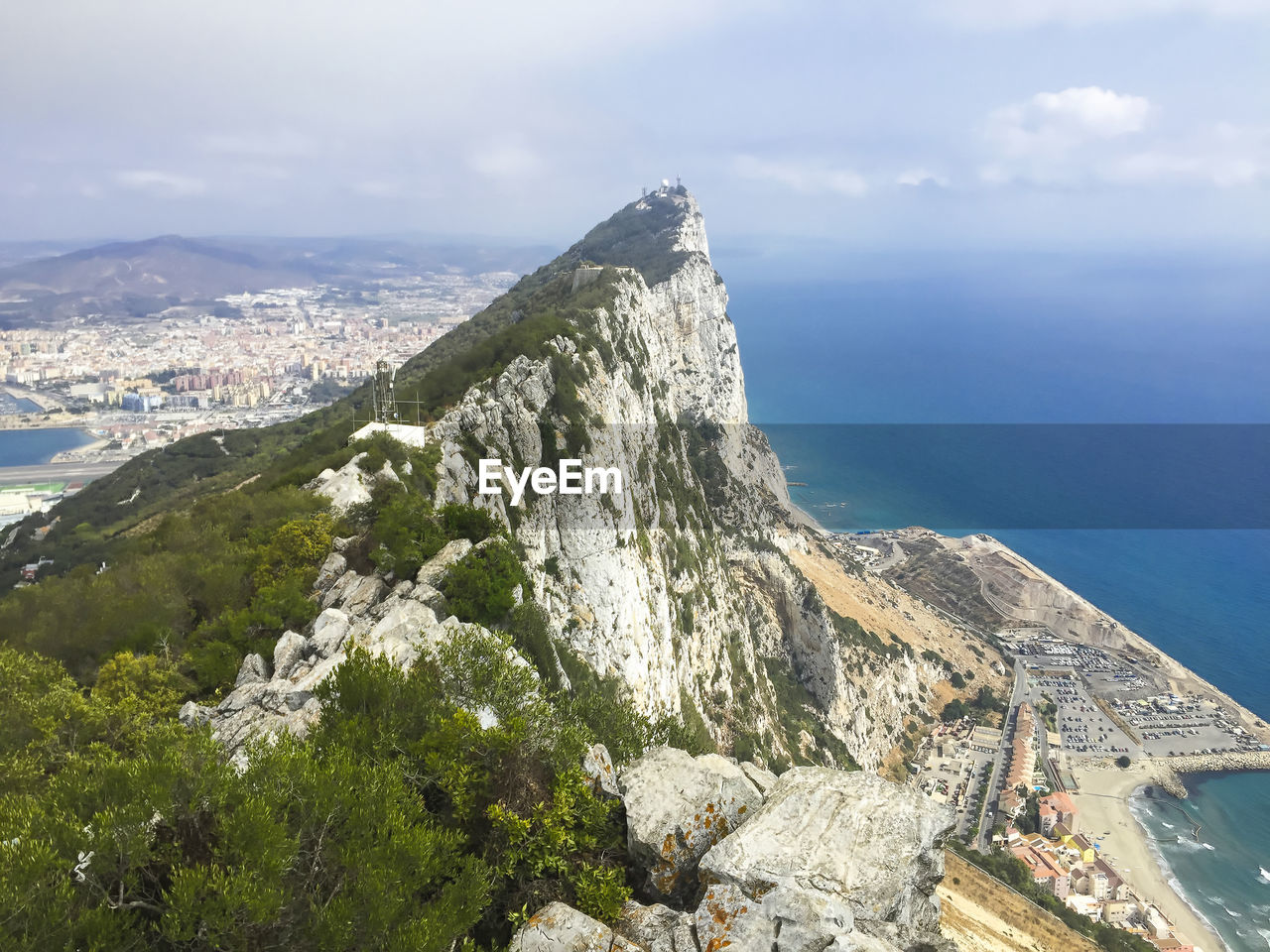 High angle view of bay and sea against sky