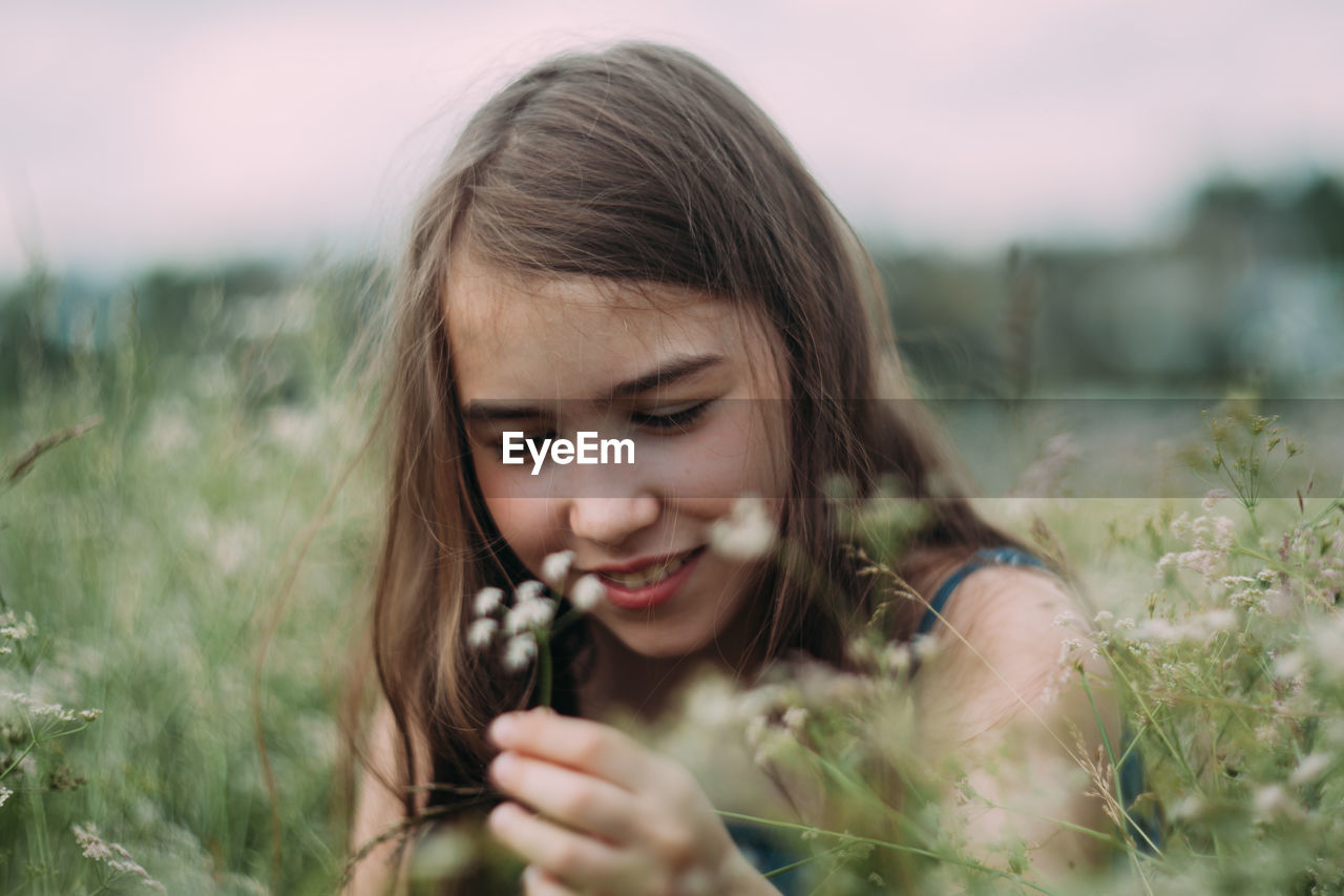 Portrait of a girl in a field