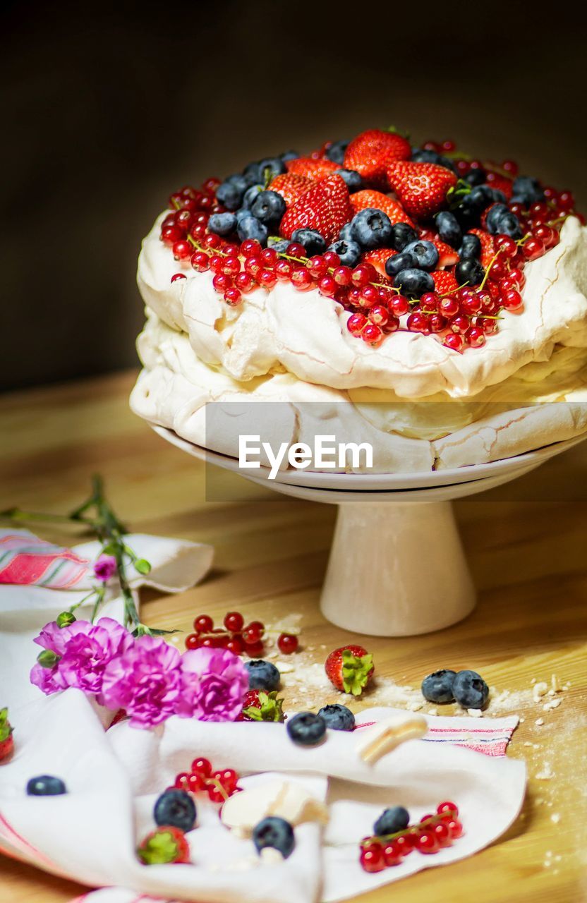 Close-up of pavlova cake with berry fruits