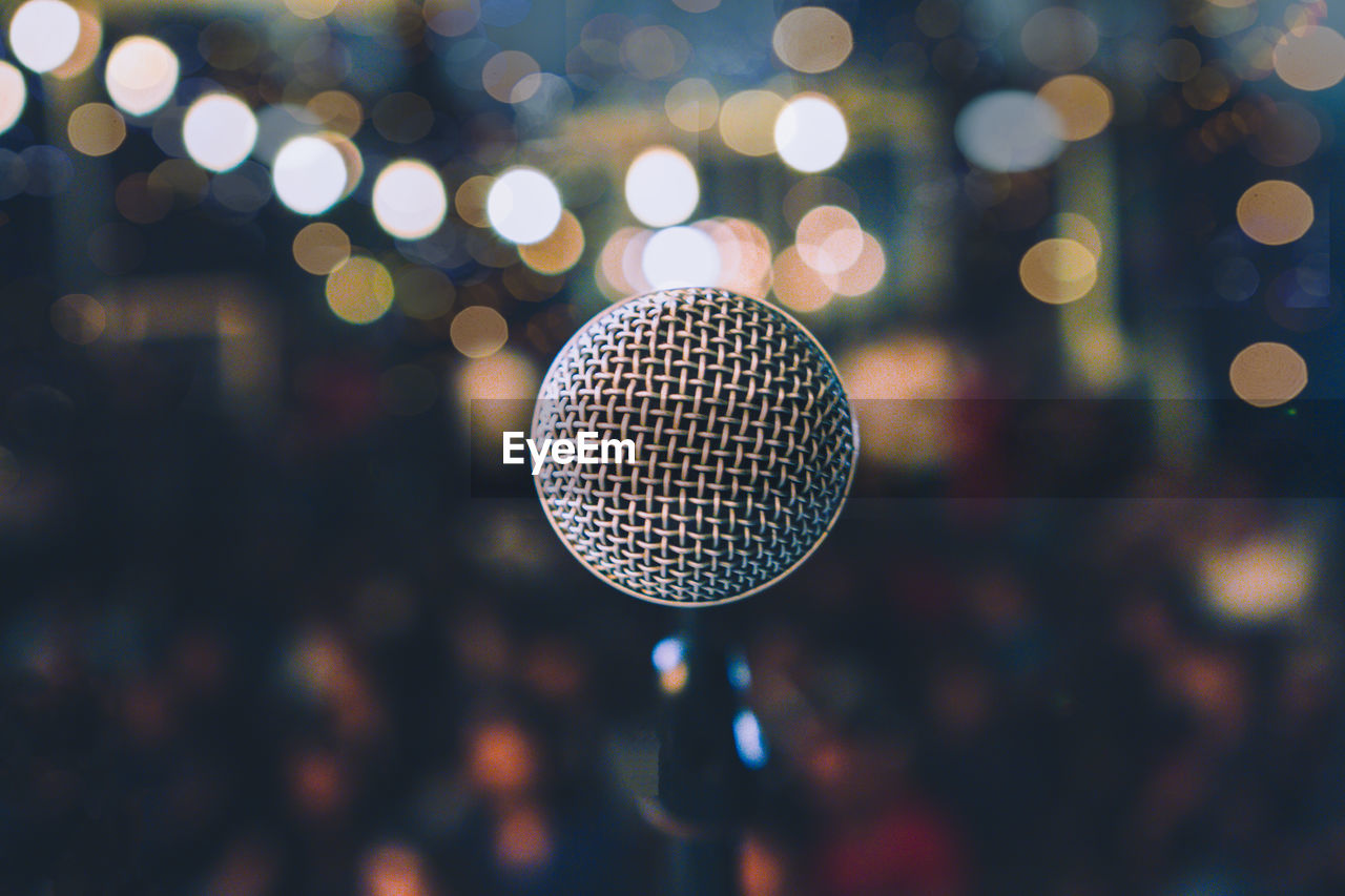 Close-up of microphone at night