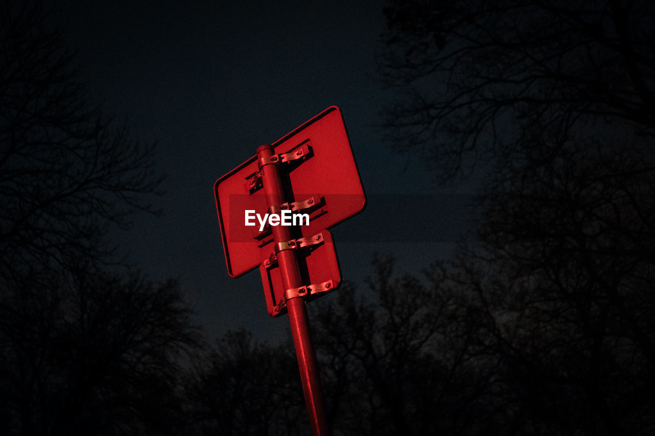 LOW ANGLE VIEW OF ROAD SIGN AGAINST SKY