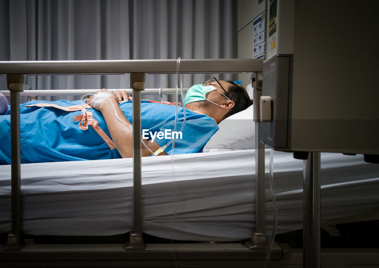 Man sleeping on bed