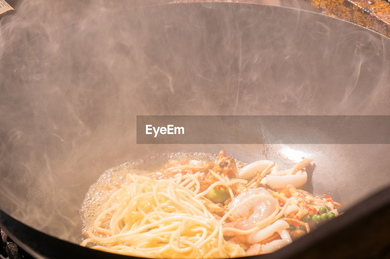high angle view of noodles in cooking pan