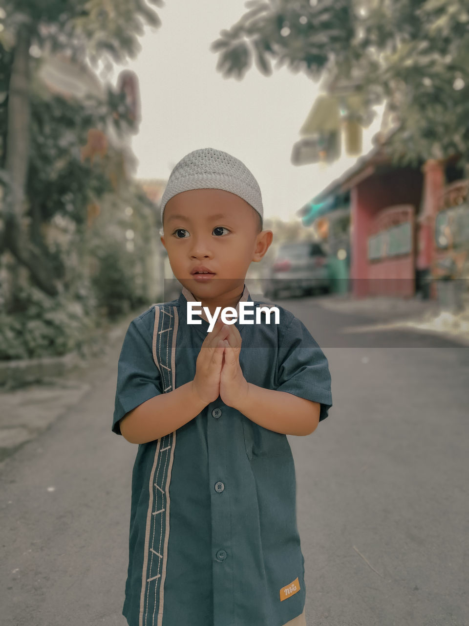 Portrait of a toddler boy eid greetings