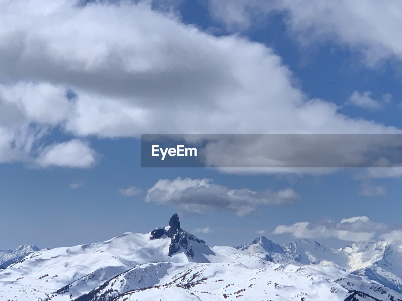 Scenic view of snowcapped mountains against sky at whistler blackcomb mountain 