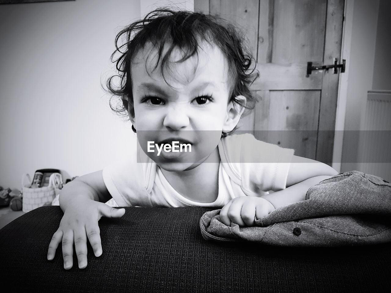 Close-up of cute baby boy at home