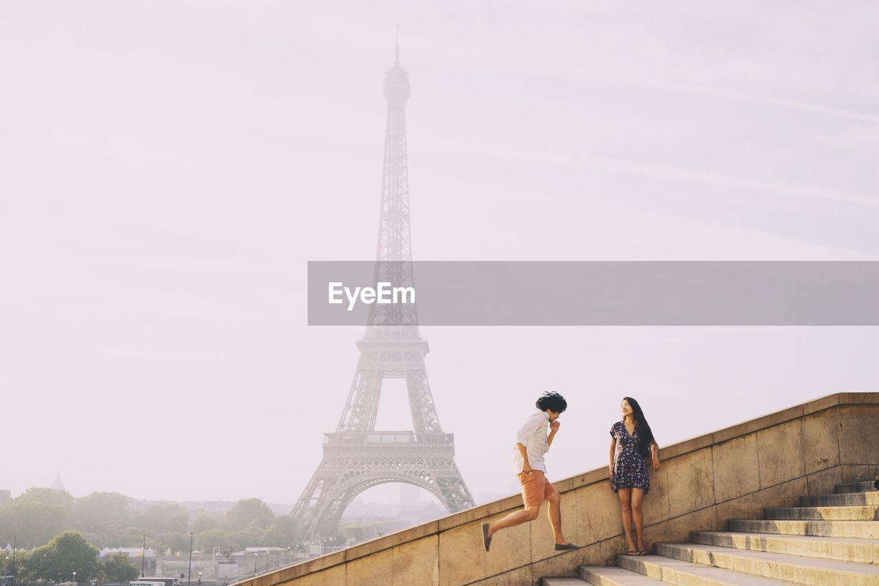 Couple in front of eiffel tower