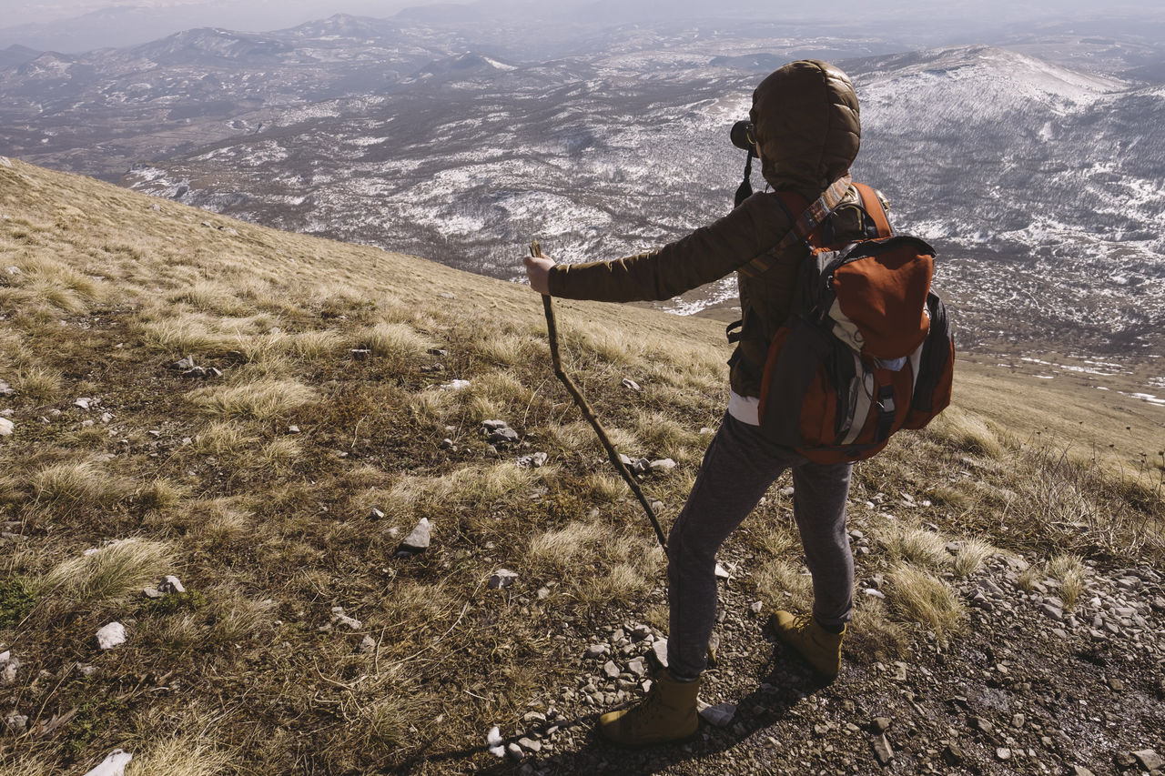 Woman hiking on mountain