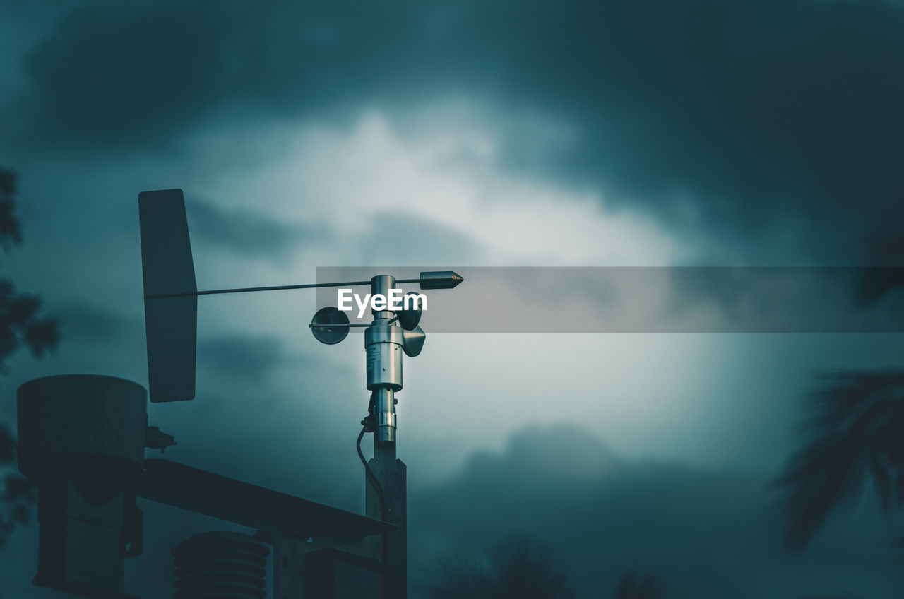 Cup anemometer is instrument used to measure wind speed and blue sky background.