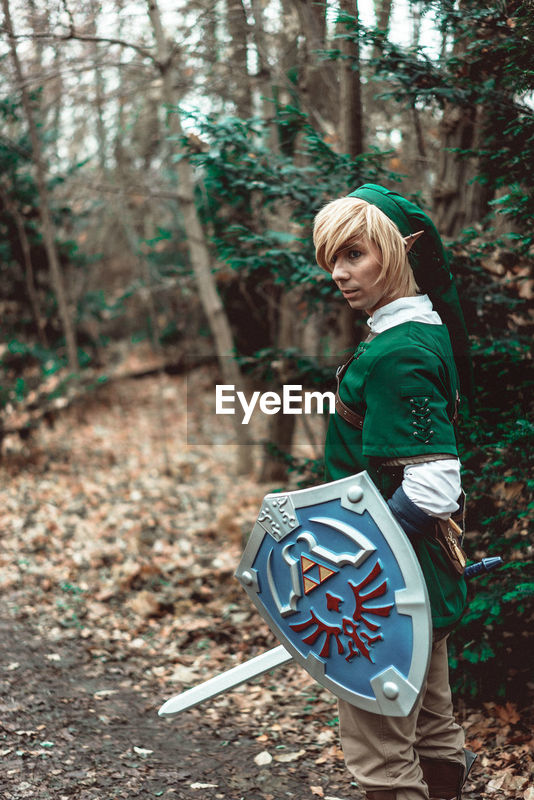 Download Side View Of Young Man In Elf Costume With Id 96951947
