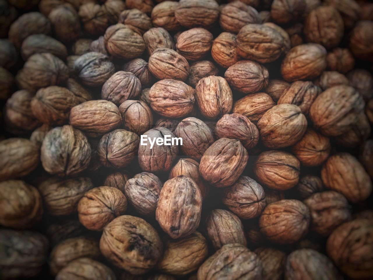 Full frame shot of walnuts for sale at market