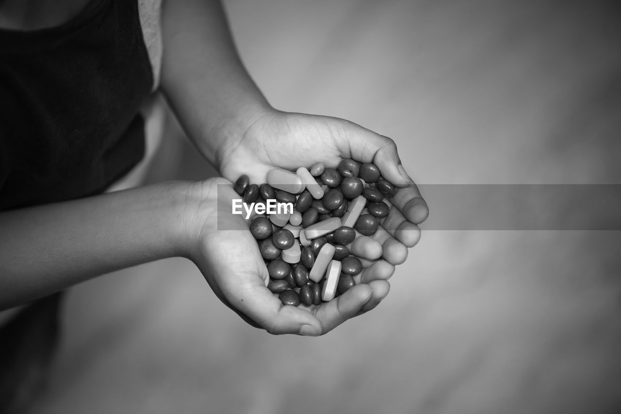 View of medicines in kid hands