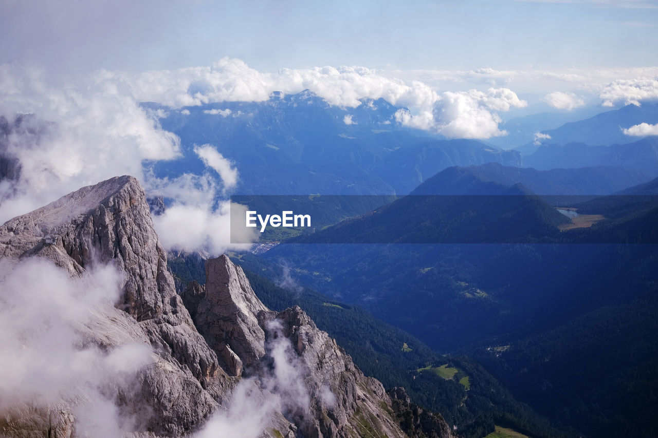 Sunny day on dolomites, hiking in summer through altopiano della rosetta