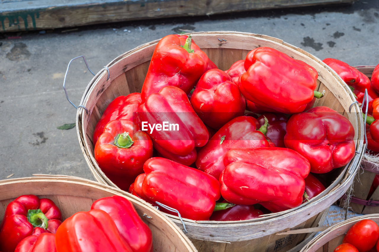 HIGH ANGLE VIEW OF RED CHILI PEPPERS IN BASKET FOR SALE