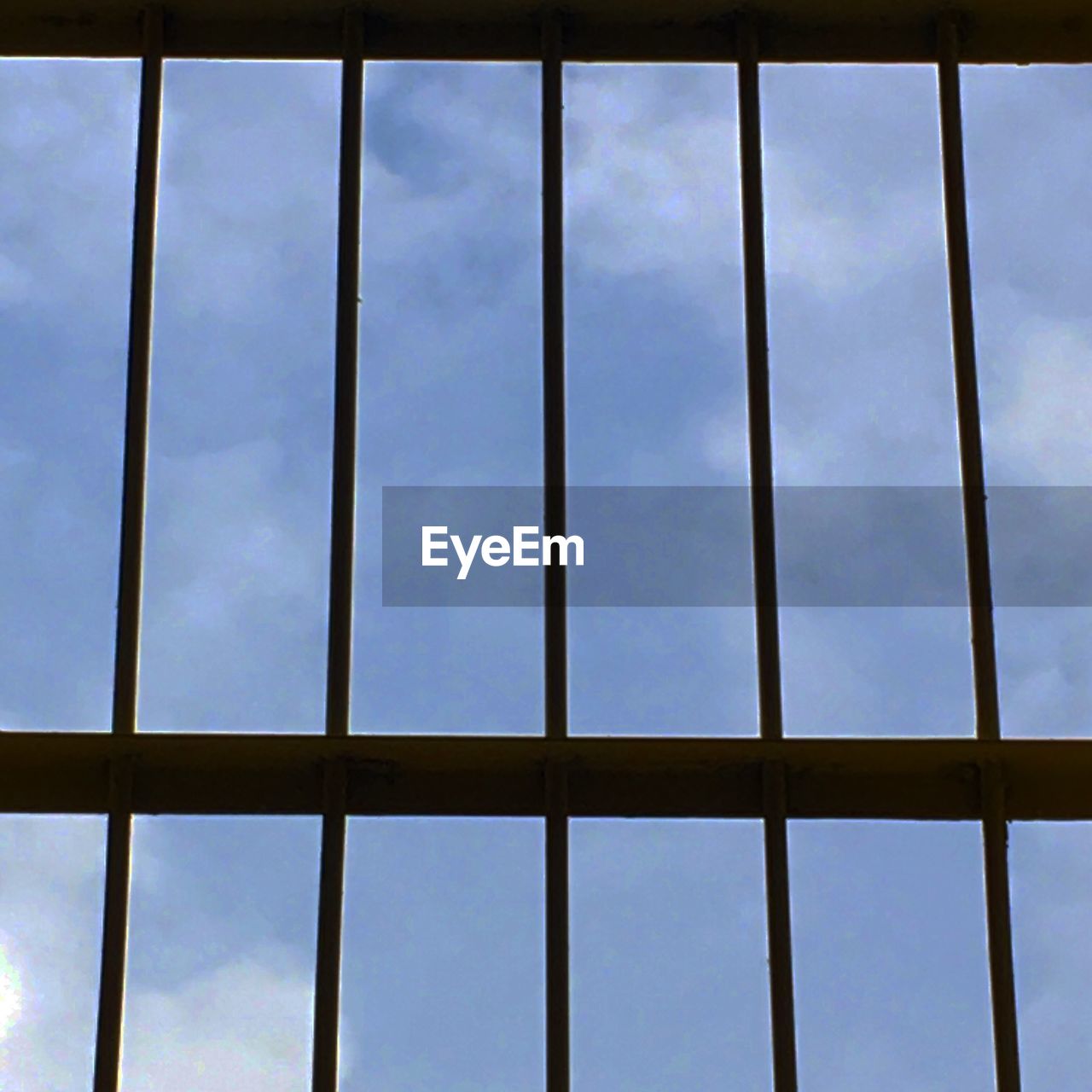 LOW ANGLE VIEW OF SKY THROUGH WINDOW