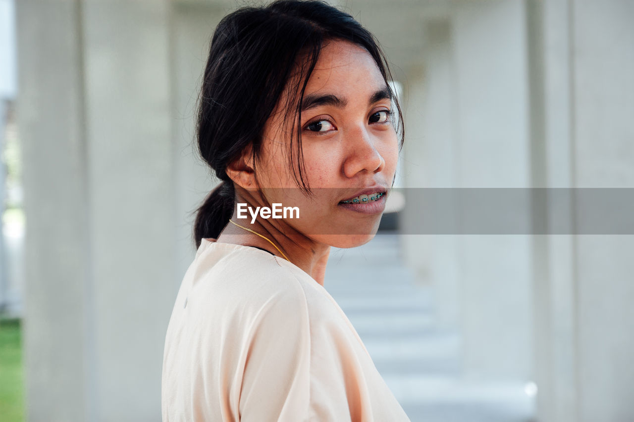Young woman looking away
