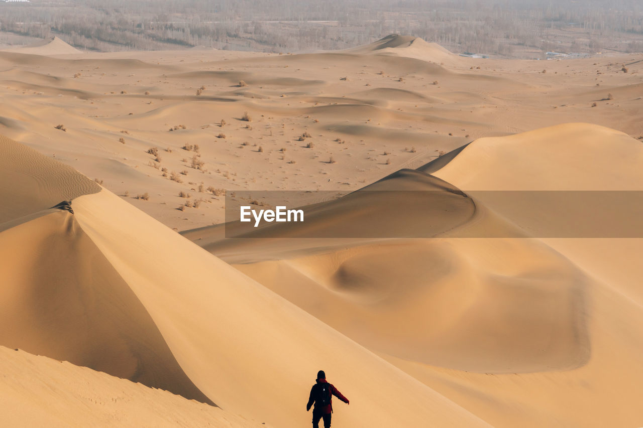 Man standing on desert 