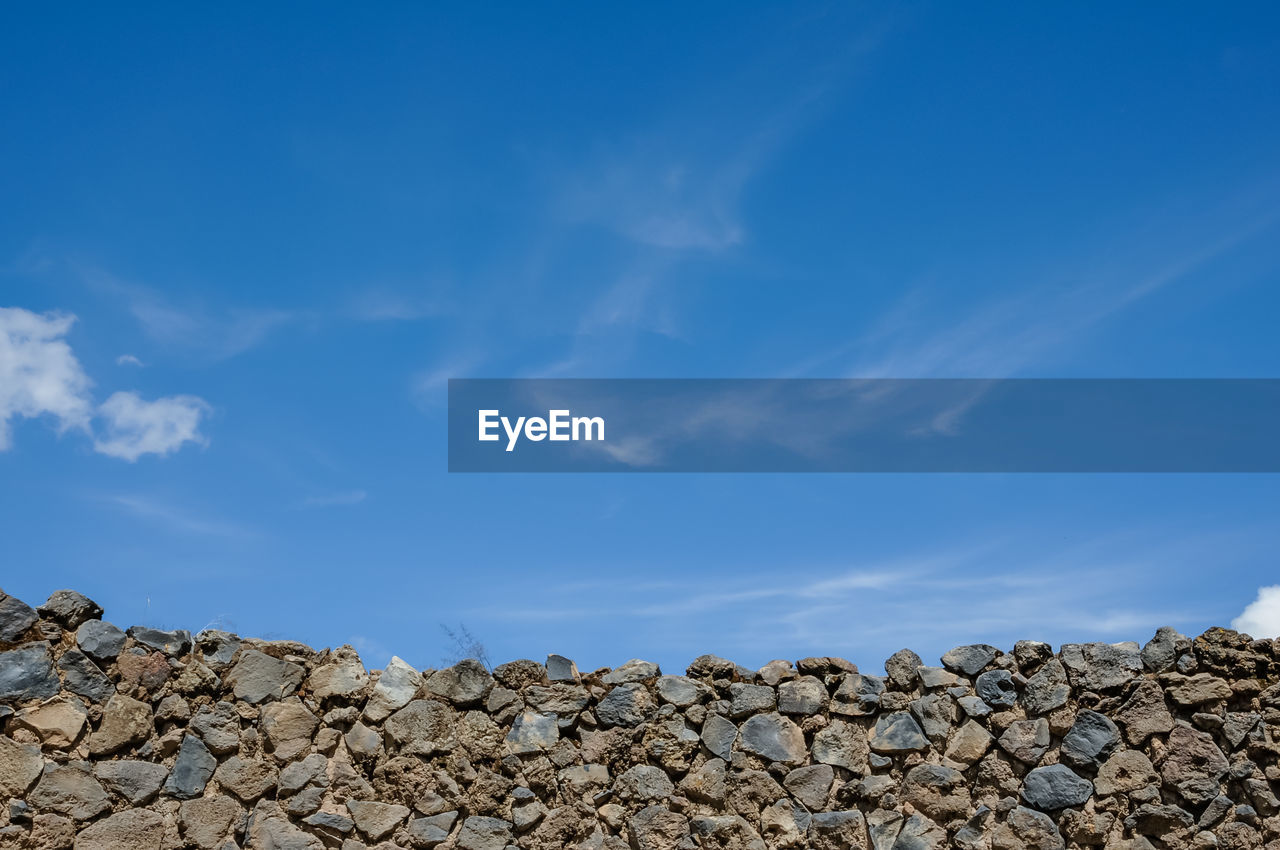 STACK OF ROCKS AND BLUE SKY