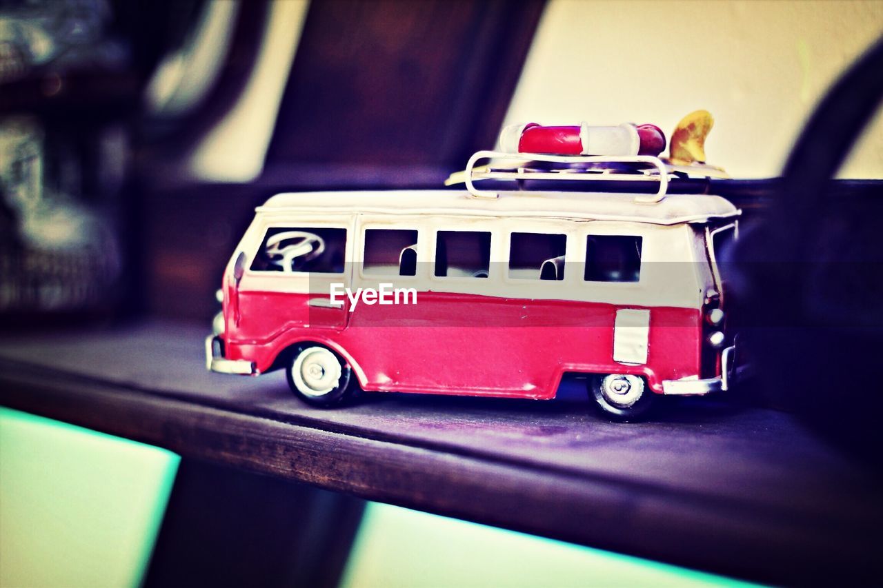Toy bus on bench