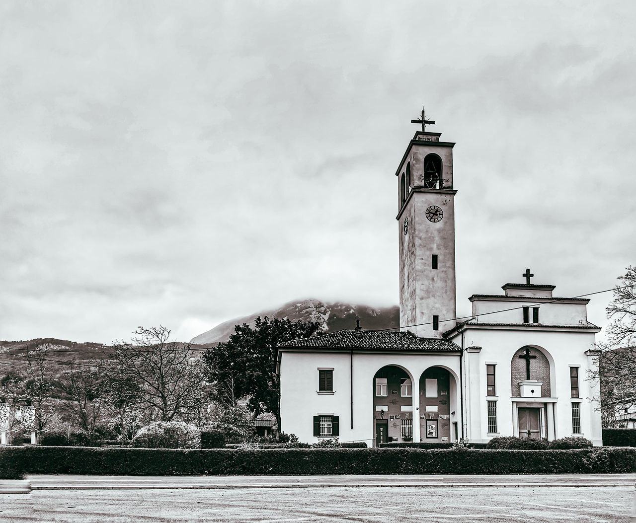 VIEW OF TOWER AGAINST BUILDING