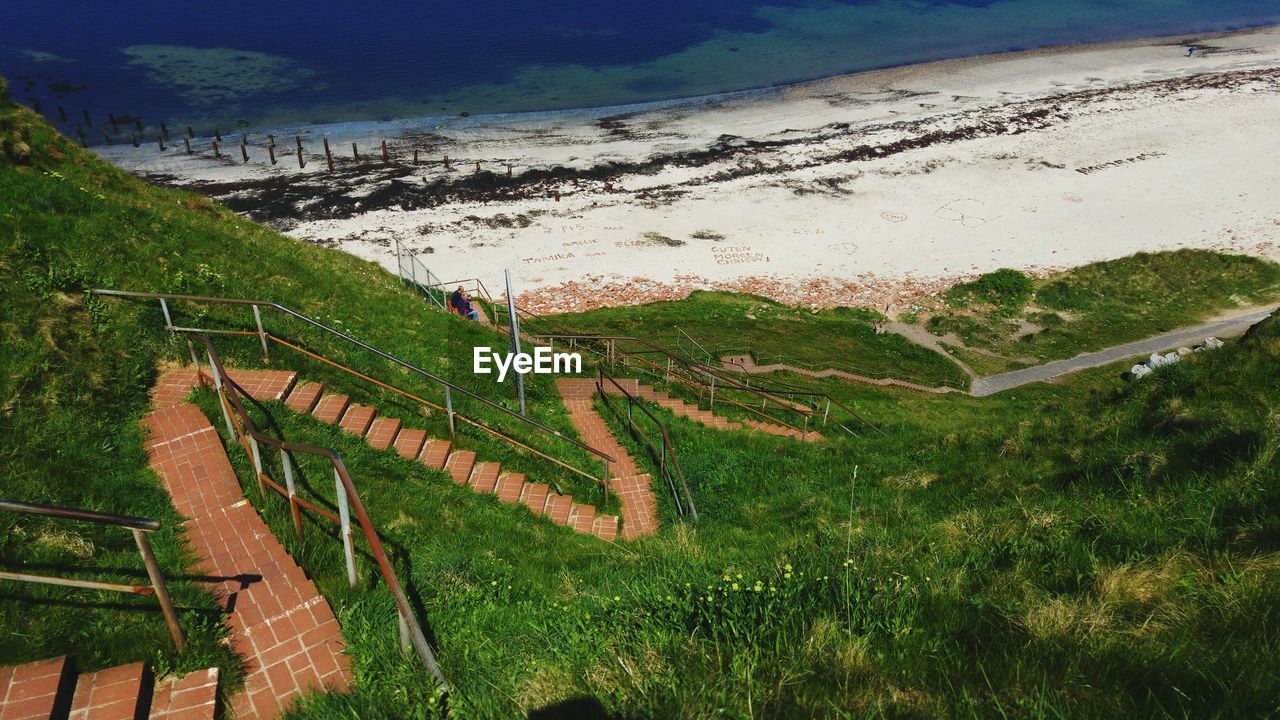 High angle view of stairs on landscape against sky