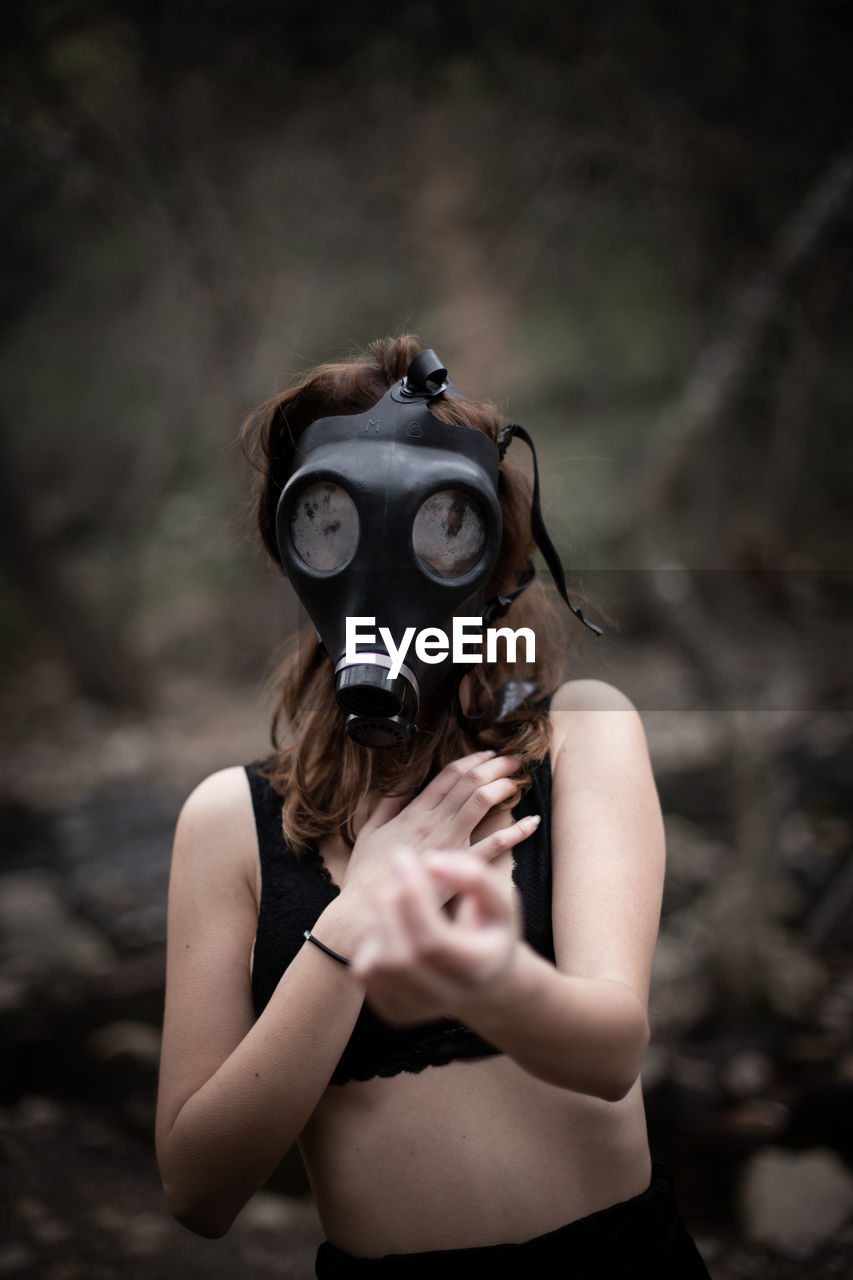 Anonymous Woman In Black Clothes And Gas Mask On Eyeem