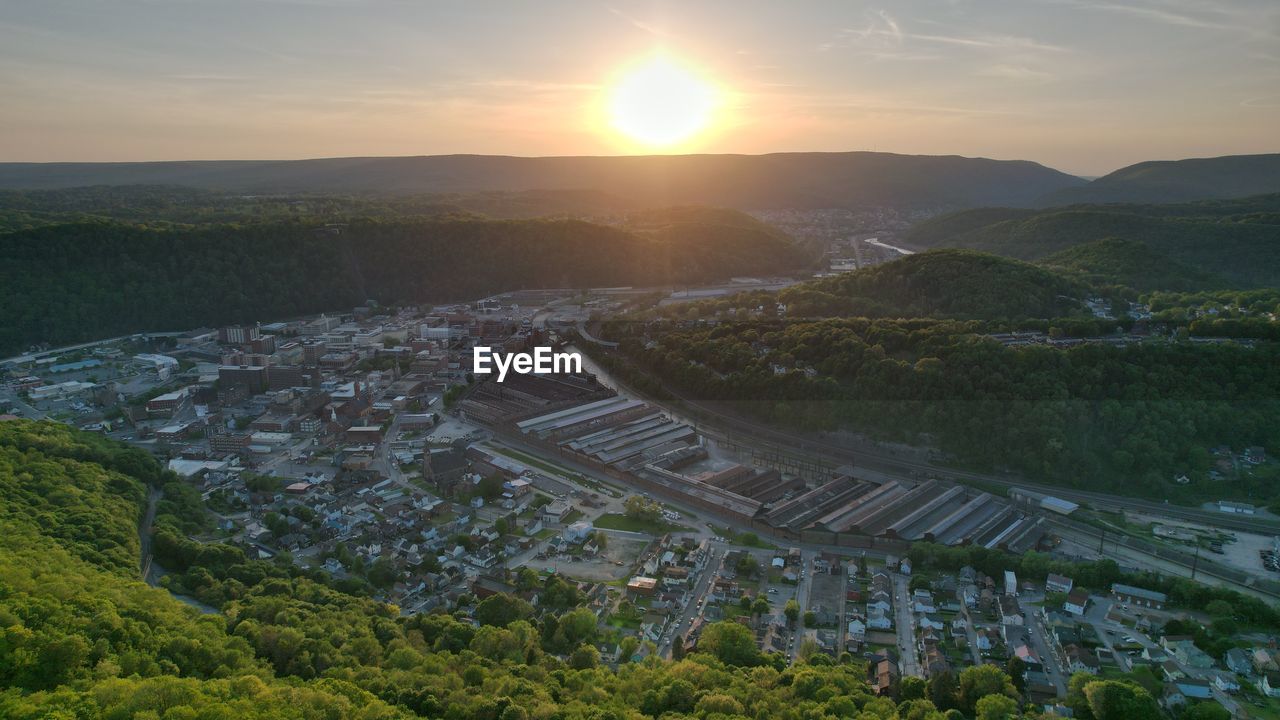 High angle view of cityscape against sky during sunset