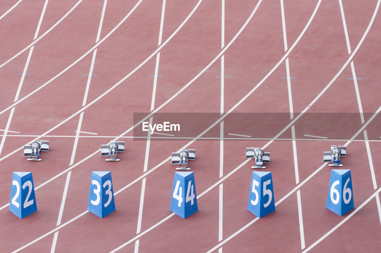 High angle view of numbers on running track at stadium