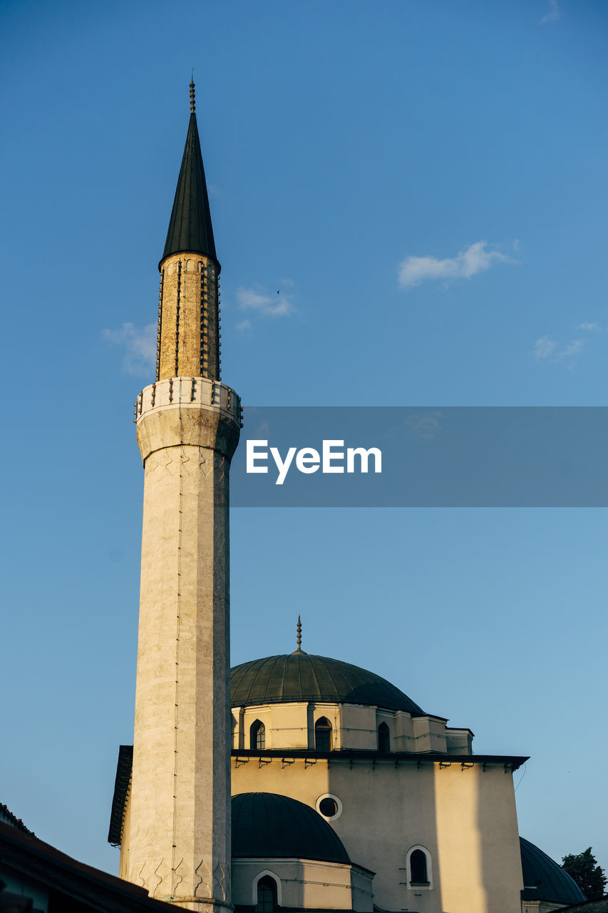 Low angle view of mosque in sarajevo against sky