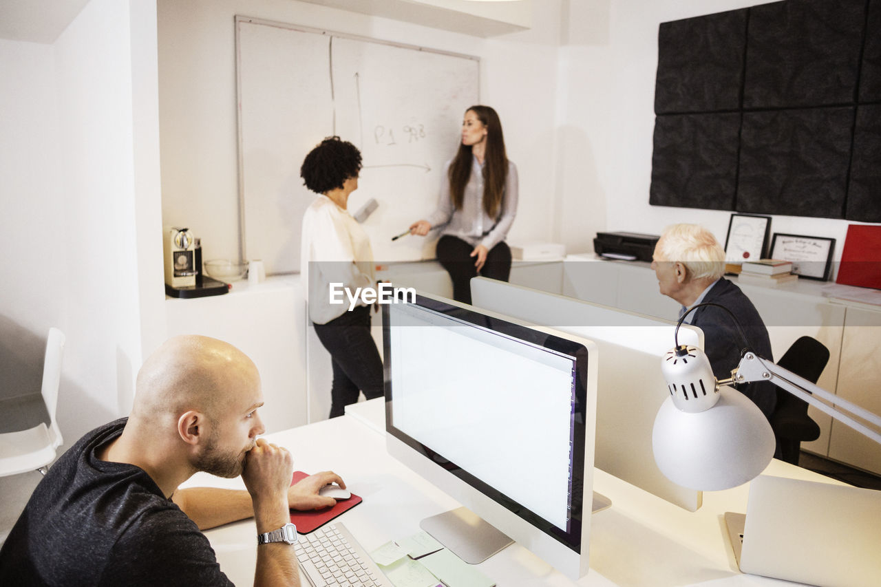 Team of architects working in office