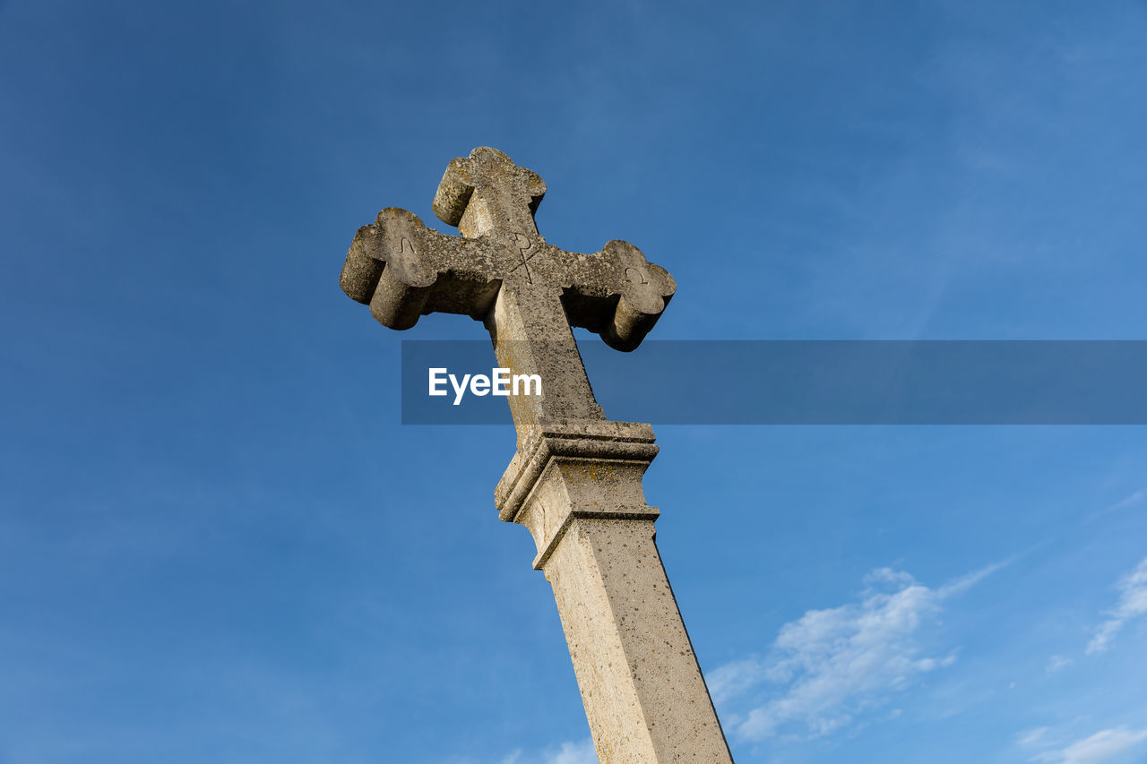 cross, sky, symbol, religion, belief, blue, spirituality, nature, cloud, catholicism, no people, low angle view, architecture, sculpture, cemetery, grave, history, day, the past, crucifix, statue, death, place of worship, religious item, monument, craft, outdoors, memorial, tombstone, cross shape, representation