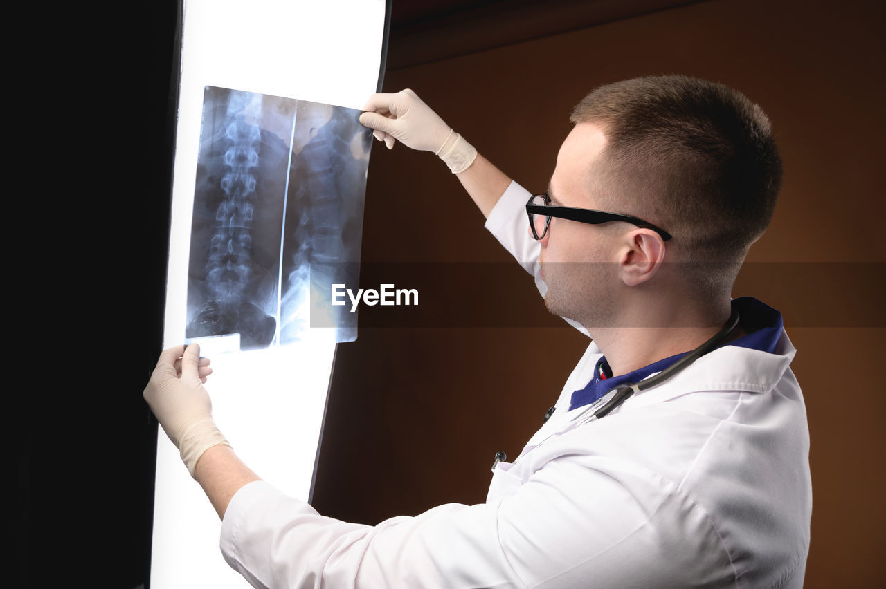 Doctor examining x-ray