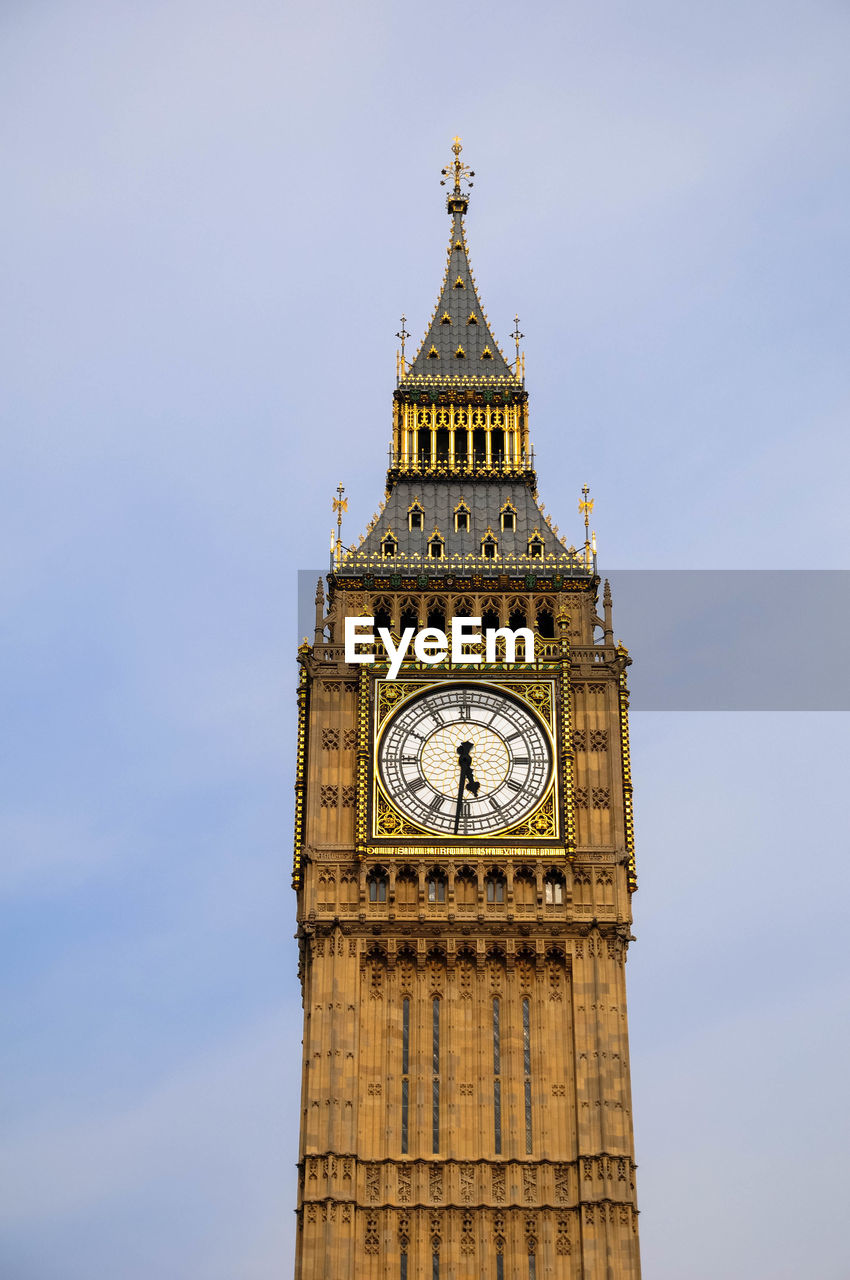 Low angle view of big ben against sky