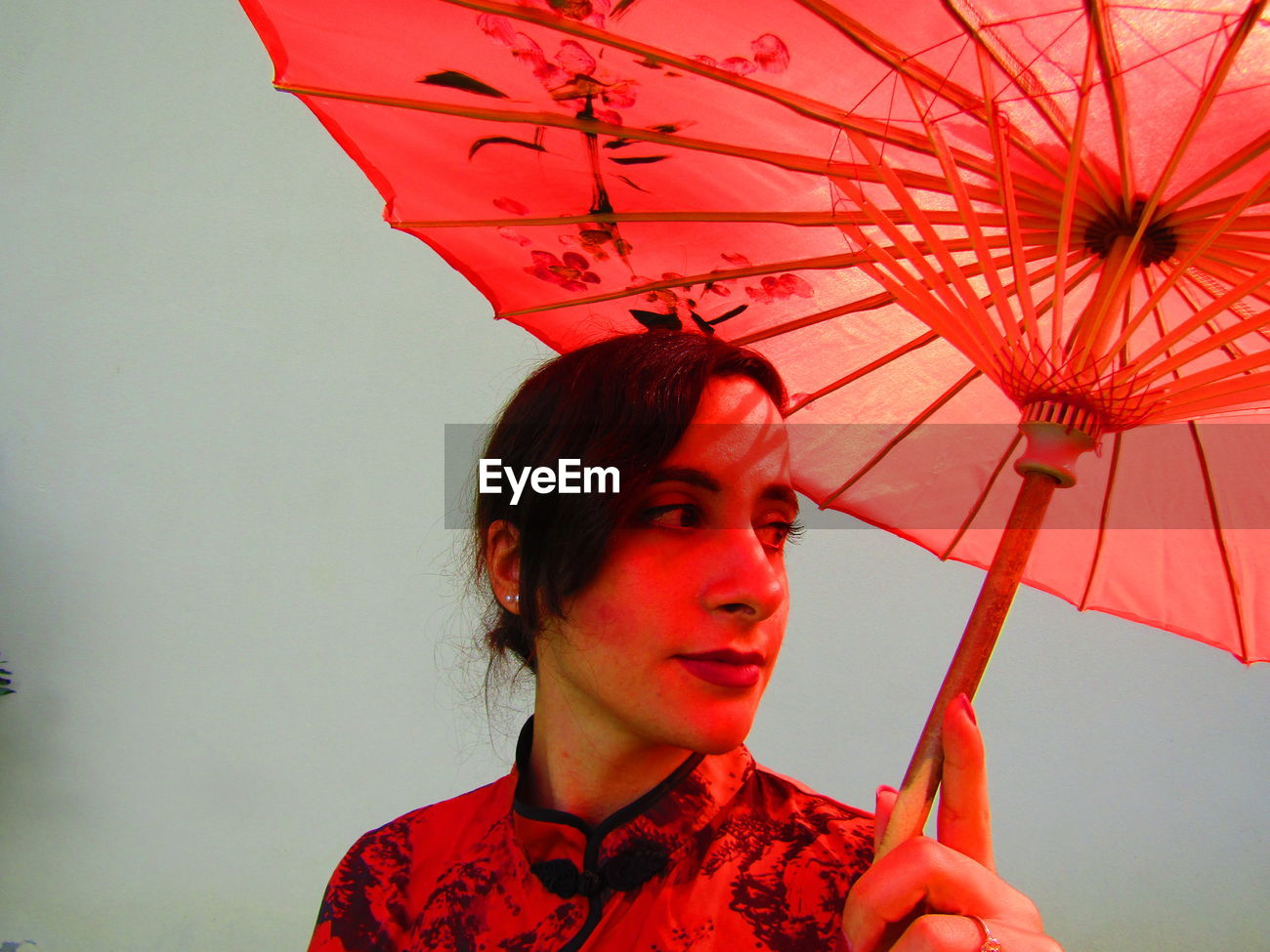 Portrait Of Young Woman Holding Umbrella Id 149247072