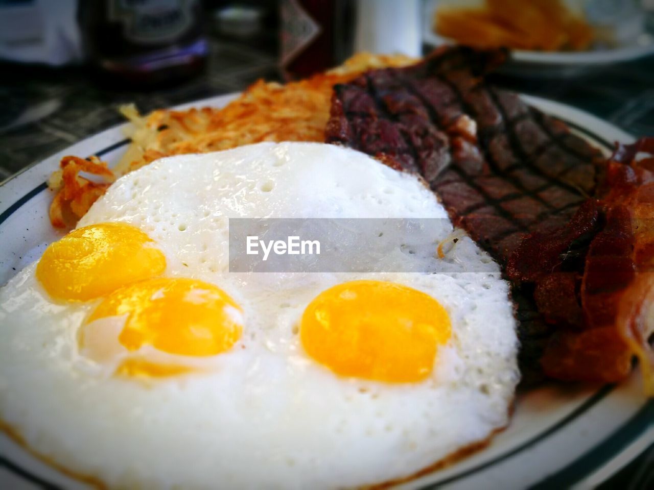 Detail shot of breakfast consisting of fried eggs