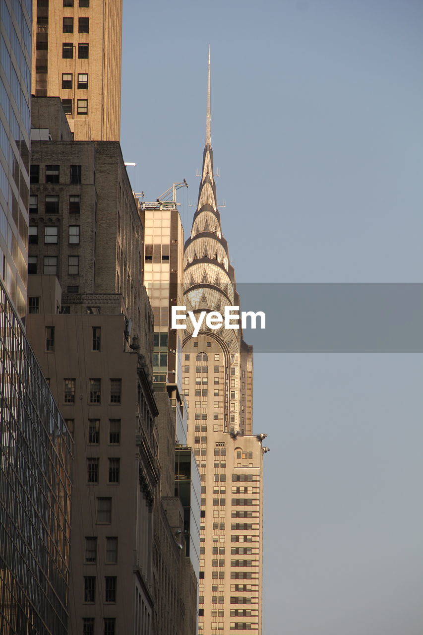 View of buildings against clear sky